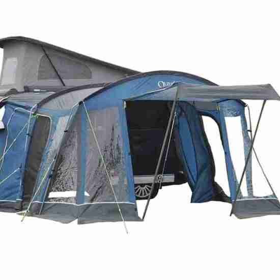 A modern Campervan Drive Away Awning Easily Erected attached to a vehicle, offering additional living space for camping enthusiasts.